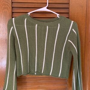 Green and white striped sweater